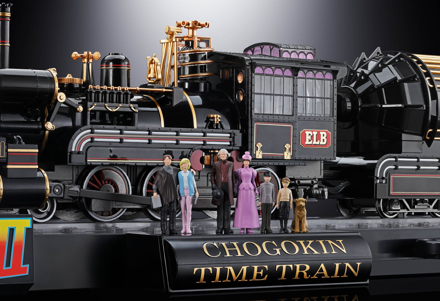 Model train set with figures and 'Chogokin Time Train' branding on a dark background