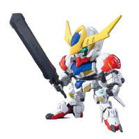 Front view of the Bandai Gundam Barbatos Lupus DX SD model kit, featuring white, red, and yellow armor with a large sword.