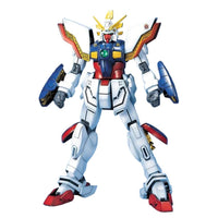 Front view of the Bandai MG 1/100 Shining Gundam model kit featuring white, red, blue, and yellow armored plating.