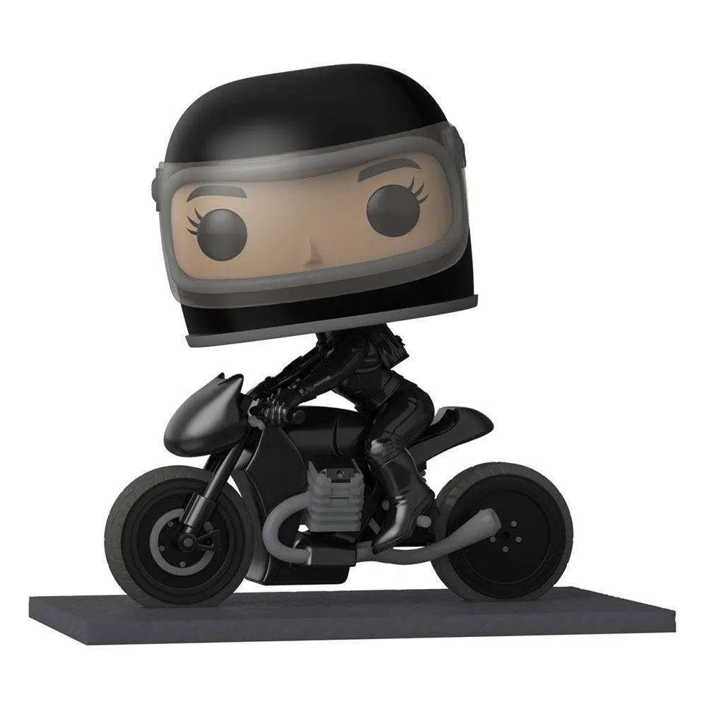 Funko Batman POP! Rides Selina Kyle on a black motorcycle, featuring a large-headed vinyl figure with a helmet.