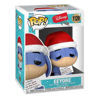 Funko Pop! Disney Eeyore Holiday vinyl figure in its original window display box, featuring a Santa hat and note.