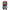 Front view of a 10-inch Funko Pop Trapjaw figure with a red helmet, green face, and mechanical arm on a blue body.