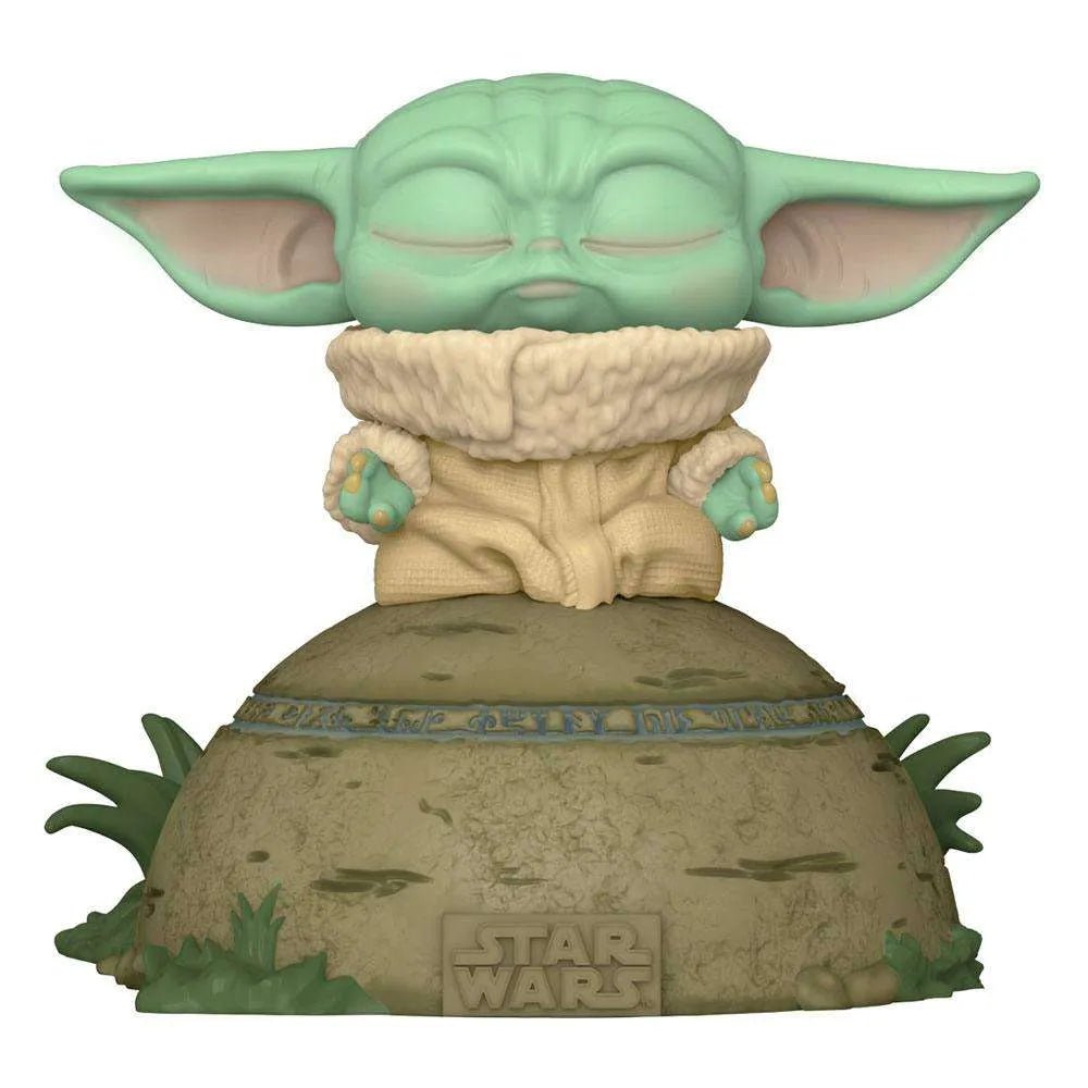 Funko POP! The Child vinyl figure using the Force on a rocky base with Star Wars branding, front view.