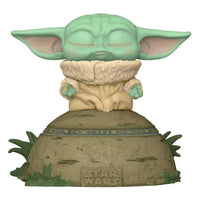 Funko POP! The Child vinyl figure using the Force on a rocky base with Star Wars branding, front view.