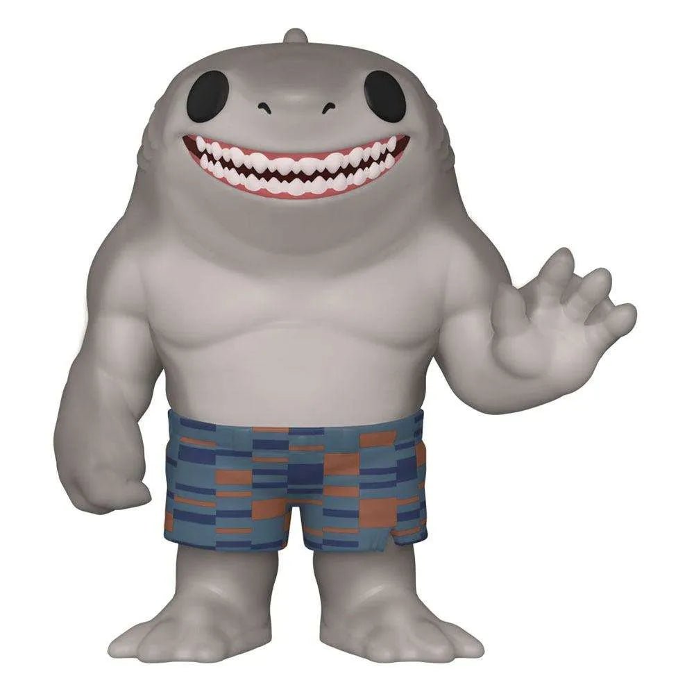 Front view of King Shark Funko Pop! vinyl figure with grey skin, a wide toothy grin, and blue patterned swim trunks.