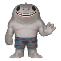 Front view of King Shark Funko Pop! vinyl figure with grey skin, a wide toothy grin, and blue patterned swim trunks.