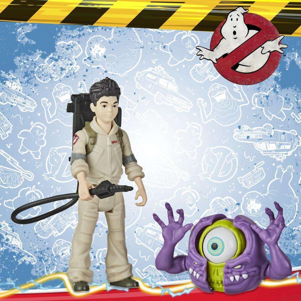 Hasbro Ghostbusters Fright Features Podcast figure in a tan jumpsuit with a proton pack facing a purple monster.