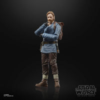 Hasbro Star Wars Black Series Obi-Wan Kenobi 6-inch figure wearing a blue tunic, brown pants, and carrying a backpack.