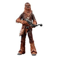 Hasbro Star Wars Black Series Chewbacca action figure holding a bowcaster, featuring brown fur and a shoulder satchel.