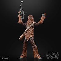 Hasbro Star Wars Black Series Chewbacca action figure holding a bowcaster, featuring brown fur and a satchel.