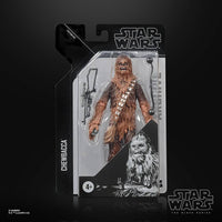 Hasbro Star Wars Black Series Chewbacca action figure in original packaging with bowcaster accessory, front view.