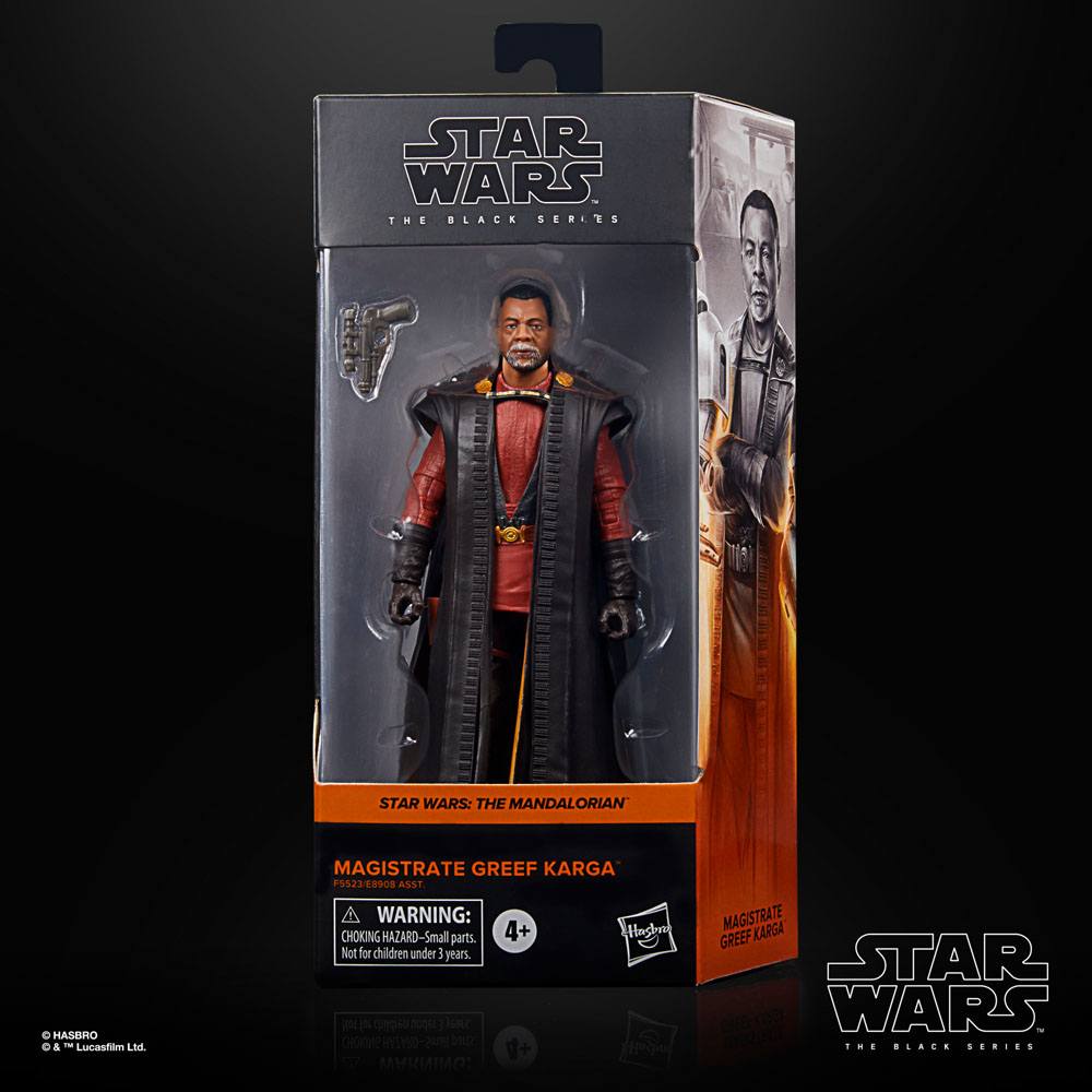 Hasbro Star Wars Black Series Magistrate Greef Karga action figure in window box packaging with included blaster.