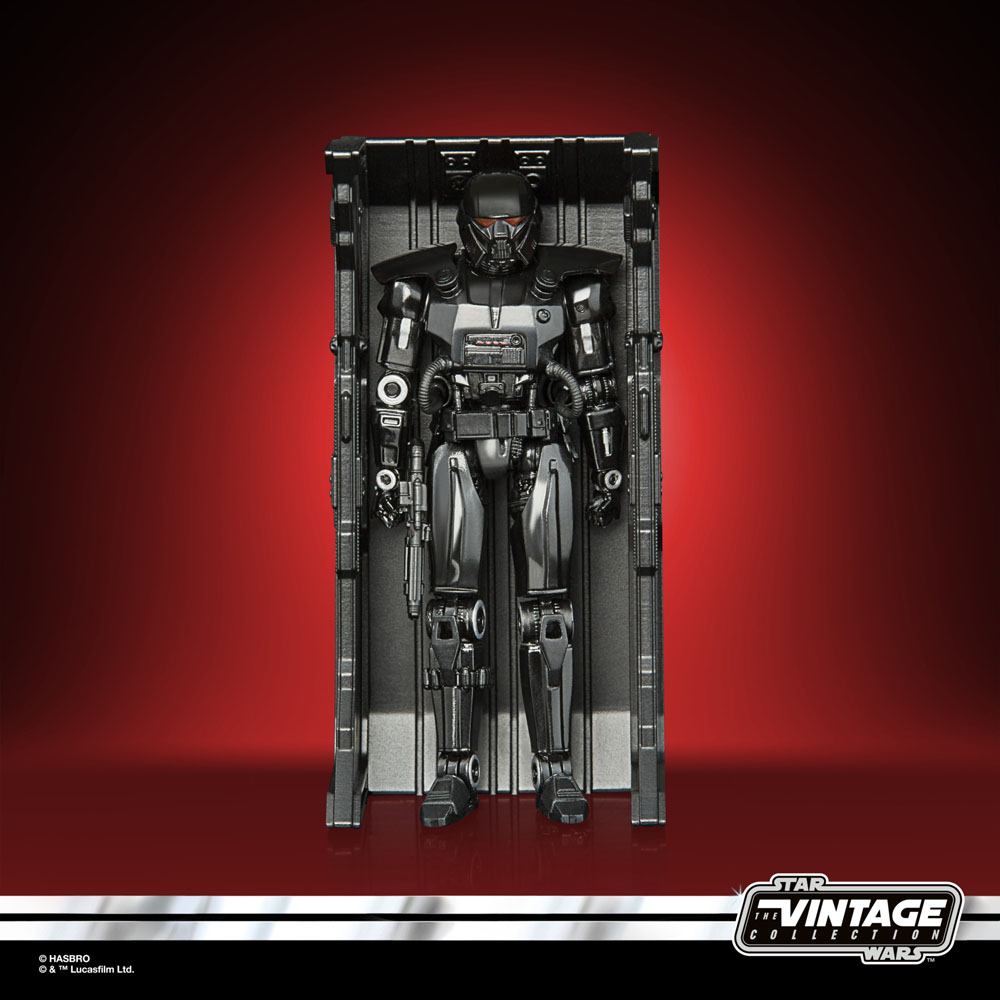 Hasbro Star Wars The Vintage Collection Dark Trooper action figure in a black storage locker against a red background.