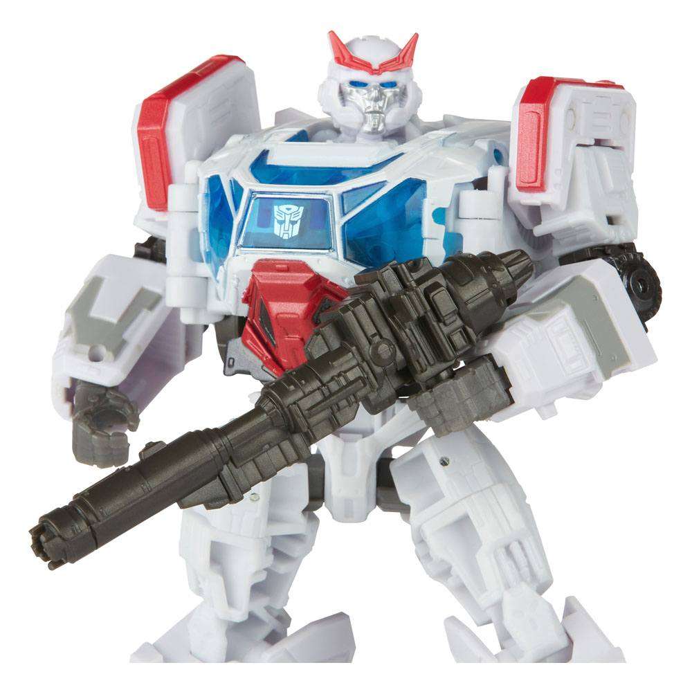Hasbro Transformers Studio Series Autobot Ratchet action figure in white and red with a dark gray blaster weapon.
