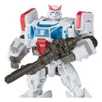 Hasbro Transformers Studio Series Autobot Ratchet action figure in white and red with a dark gray blaster weapon.