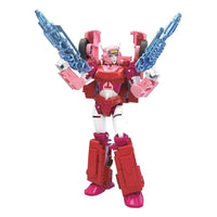 Hasbro Transformers Legacy Elita-1 action figure in pink and red, posing with two translucent blue blaster accessories.