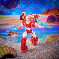 Hasbro Transformers Legacy Elita-1 action figure in pink and white, holding two translucent blue blasters on a planet.
