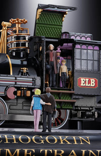 Model train set with figures and 'ELB' branding on a dark background
