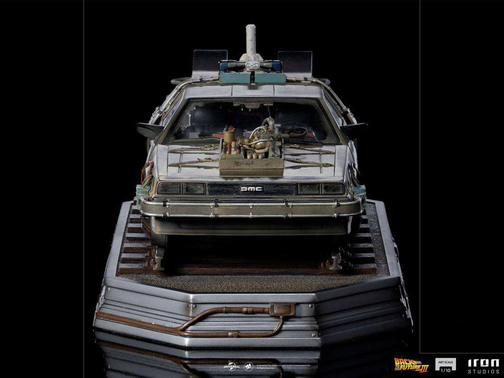 Front view of the Iron Studios 1/10 scale Back to the Future III DeLorean statue on a detailed railroad track base.