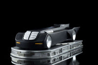 Side view of the Iron Studios 1/10 scale Batmobile from Batman The Animated Series on a metallic display base.
