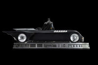 Side view of Iron Studios Batman The Animated Series 1/10 scale Batman and Batmobile statue on a detailed base.