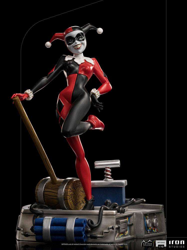 Iron Studios 1/10 Harley Quinn statue from Batman The Animated Series, featuring her iconic jester suit and mallet.