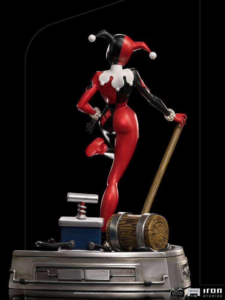 Back view of Iron Studios Harley Quinn 1/10 scale statue in her classic red and black jester suit with a mallet.