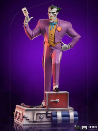 Iron Studios 1/10 scale Joker statue from Batman The Animated Series, featuring the villain holding a playing card.