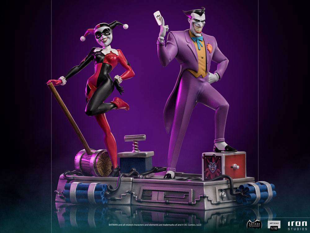 Iron Studios 1/10 scale Joker and Harley Quinn statues from Batman: The Animated Series on a themed base.