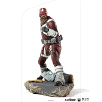 Iron Studios Red Guardian 1/10 scale statue in a dynamic pose, wearing a detailed red and white tactical suit.