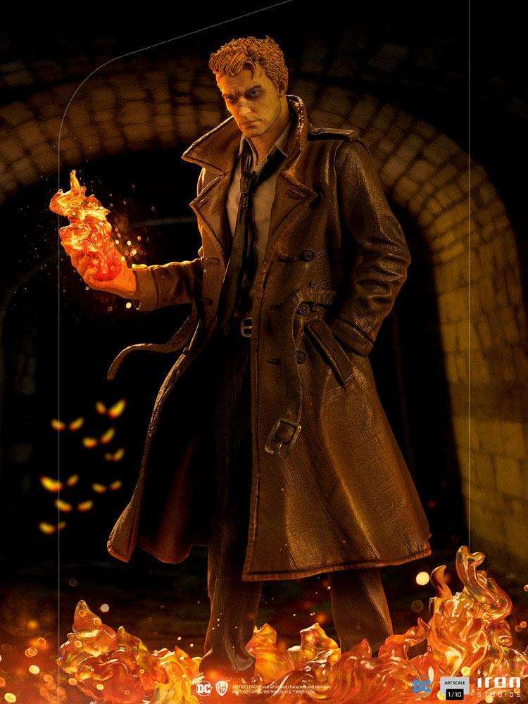 Iron Studios 1/10 scale Constantine statue featuring the character in a trench coat holding magical fire flames.