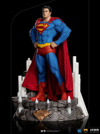 Iron Studios Superman Unleashed 1/10 scale statue in a front view, featuring a fabric cape and crystal-themed base.