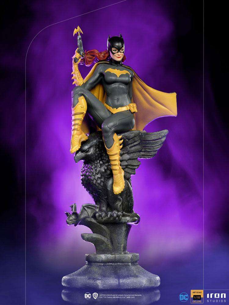 Iron Studios 1/10 Batgirl Deluxe Art Scale statue featuring the hero perched on a stone gargoyle against purple smoke.