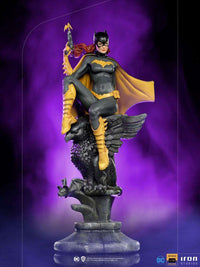 Iron Studios 1/10 Batgirl Deluxe Art Scale statue featuring the hero perched on a stone gargoyle against purple smoke.