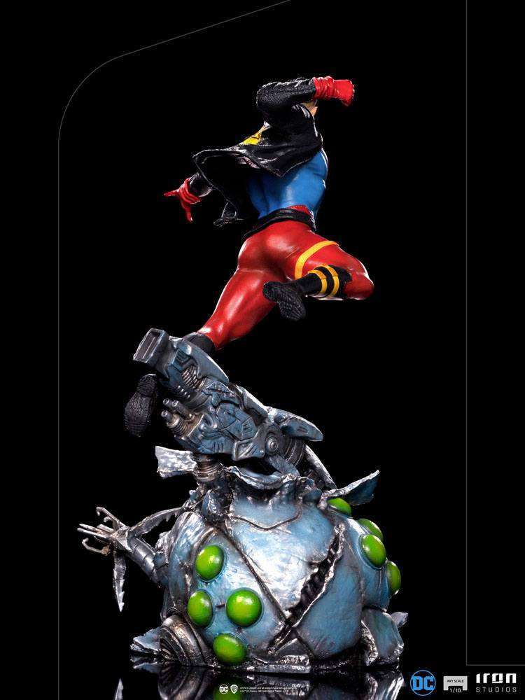 Back view of the 1/10 scale Iron Studios Superboy statue, featuring a dynamic pose atop a metallic, green-orb base.