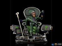 Iron Studios 1/10 The Riddler statue in a green suit sitting on a question mark throne with monitors and cane.