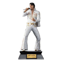 Iron Studios 1/10 scale Elvis Presley 1973 statue in a white jeweled jumpsuit holding a microphone on a display base.