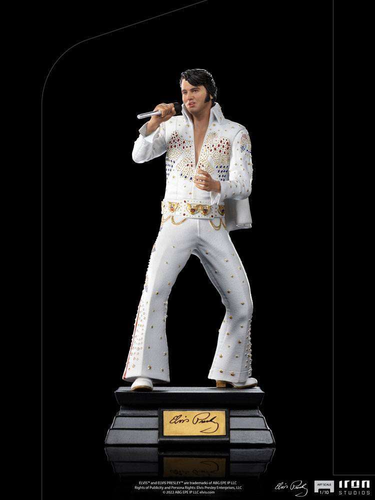 Iron Studios 1/10 scale Elvis Presley 1973 statue in a white jeweled jumpsuit, singing on a black display base.