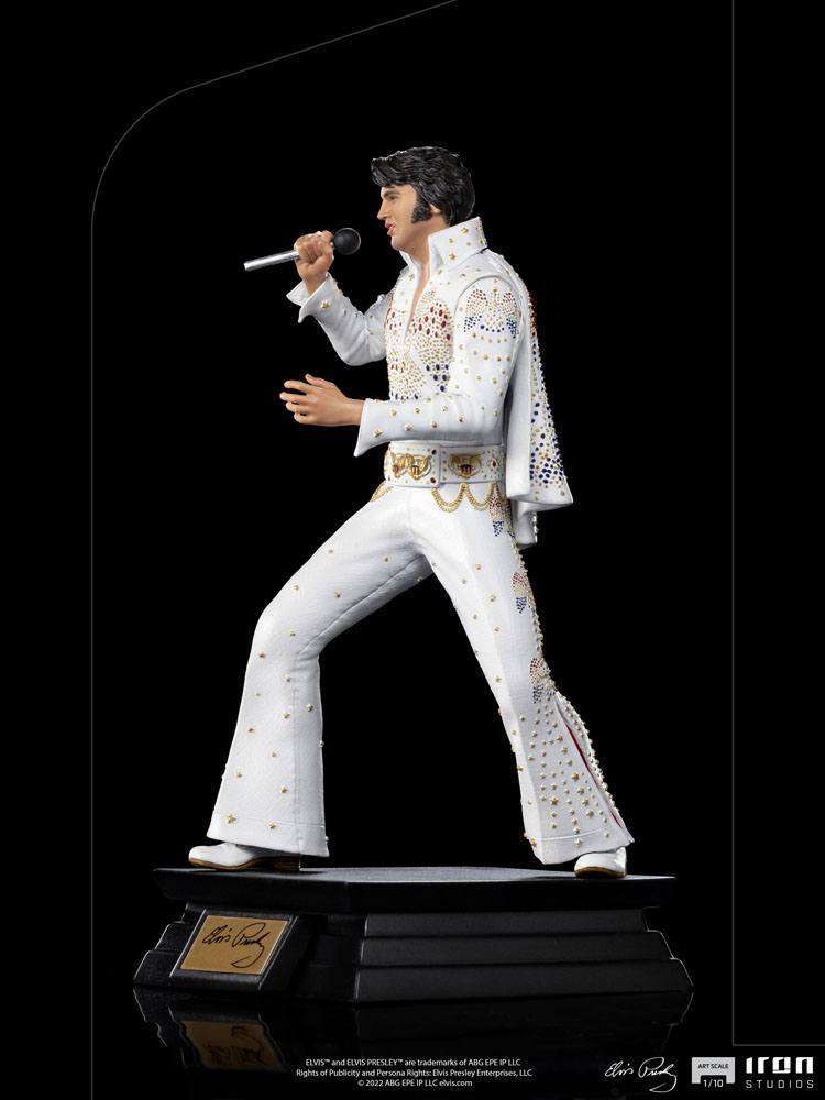Side view of the 1/10 scale Iron Studios Elvis Presley 1973 statue wearing his iconic white jeweled jumpsuit.