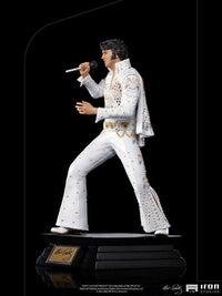 Side view of the 1/10 scale Iron Studios Elvis Presley 1973 statue wearing his iconic white jeweled jumpsuit.
