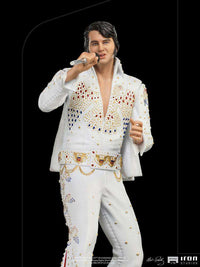 Front view of the Iron Studios 1/10 scale Elvis Presley 1973 statue in a white jeweled jumpsuit holding a microphone.