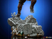 Close-up of the detailed stone base for the Iron Studios God of War Kratos & Atreus 1/10 scale statue.