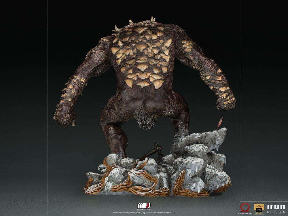 Back view of the 32 cm Iron Studios God of War Ogre statue featuring textured brown skin and bone-like armor plates.