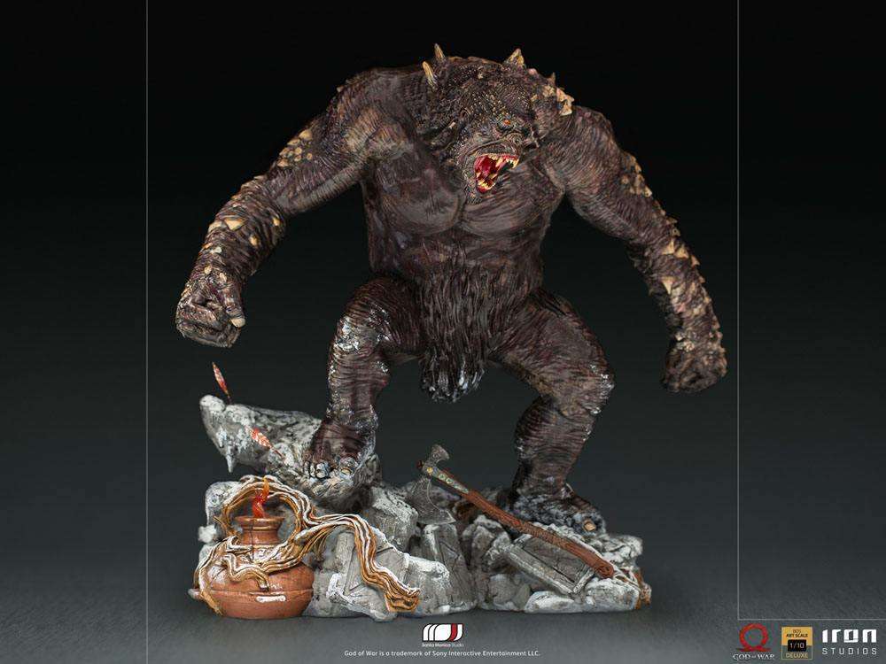 Iron Studios God of War Ogre 1/10 scale statue featuring a snarling, dark-furred beast on a detailed rocky base.