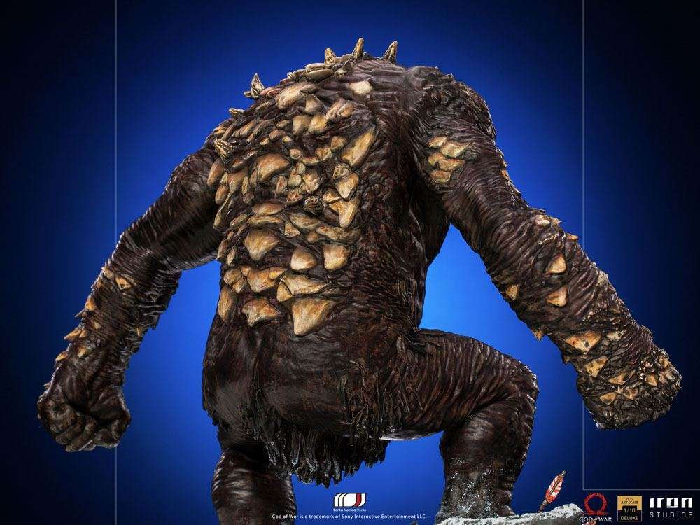Back view of the Iron Studios God of War Ogre 1/10 scale statue featuring textured brown skin and rocky back spikes.