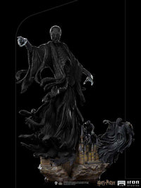 Iron Studios 1/10 scale Dementor statue featuring a dark, flowing cloaked figure hovering over a Hogwarts castle base.