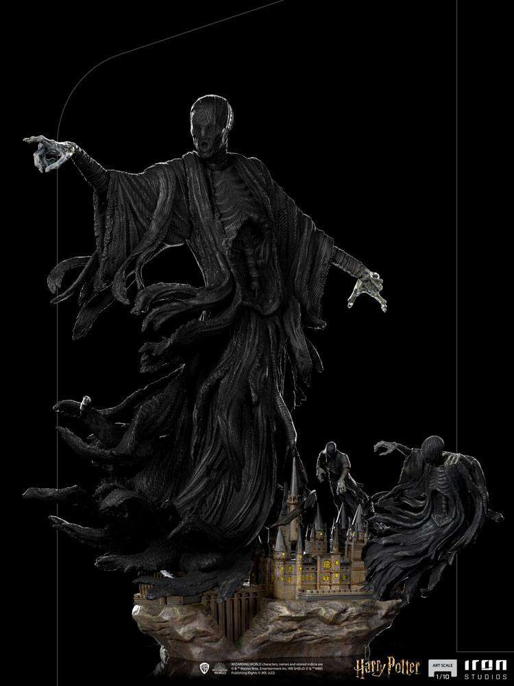 Iron Studios 1/10 Dementor statue featuring a dark, flowing figure hovering above a detailed Hogwarts castle base.
