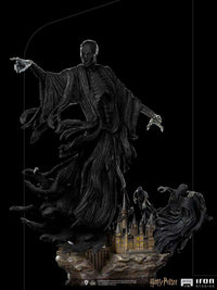 Iron Studios 1/10 Dementor statue featuring a dark, flowing figure hovering above a detailed Hogwarts castle base.