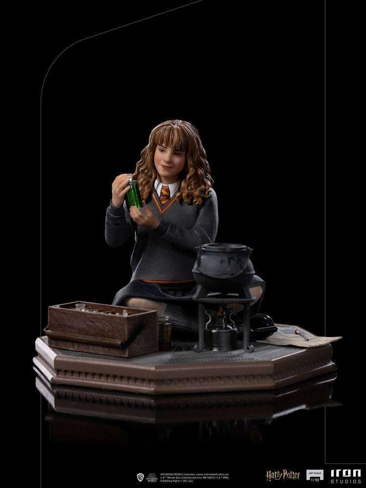 Iron Studios 1/10 scale Hermione Granger Polyjuice statue showing her with a potion vial and cauldron on a base.