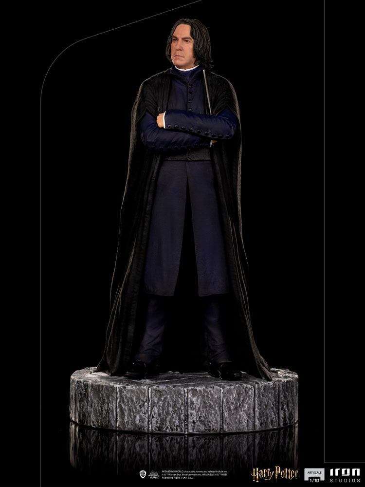 Front view of the 22 cm Iron Studios Severus Snape 1/10 scale statue wearing a black cloak on a stone-textured base.